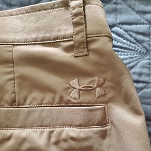Under Armor heat gear tan golf shorts.
